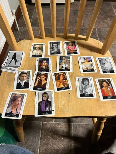 OO7 Bond girls playing cards
