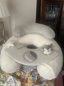 Mamas and Papa's sit and play baby floor seat. https://www.mamasandpapas.ie/products/sit-play-wish-upon-a-cloud-7599wc100