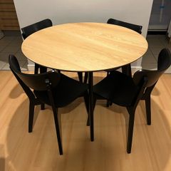 Wooden table with four chairs
