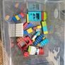 Box of Lego. 4 Figures and 4 Small Base Plates Image 2