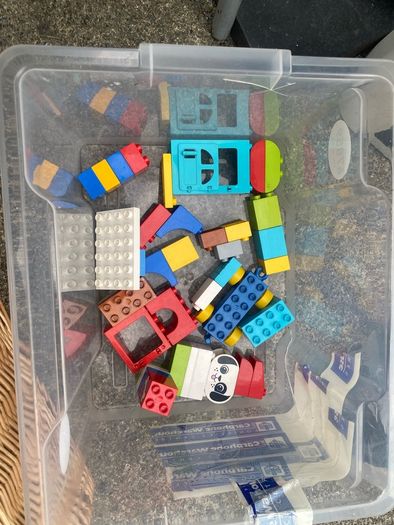 Box of Lego. 4 Figures and 4 Small Base Plates