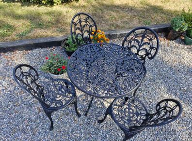 Vintage cast aluminium table and chairs