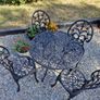 Vintage cast aluminium table and chairs Image 4