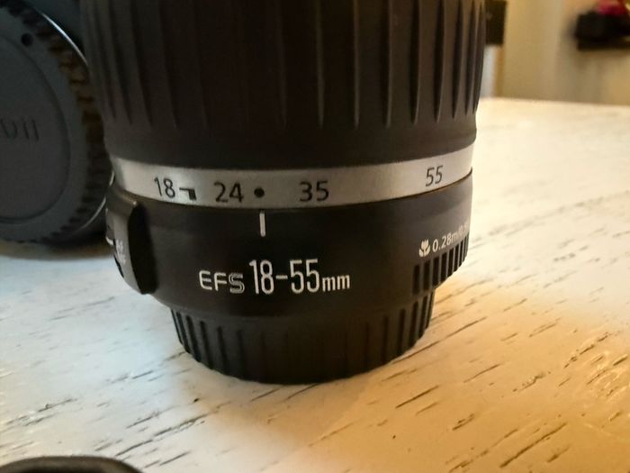 Canon EOS Rebel XT with 18-55mm lense and extras