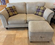 Two-seater sofa with matching storage footstool