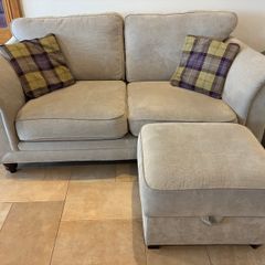 Two-seater sofa with matching storage footstool