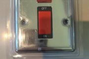Oven mains switch