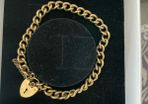 Stunning 9ct gold vintage heavy charm bracelet