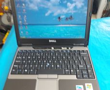 DELL LATITUDE D410, (Vintage), .5GB Ram, 40GB HDD, Original Windows XP, Excellent Battery and in super cosmetic condition,