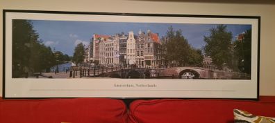 A beautiful black framed panoramic photo of Amsterdam