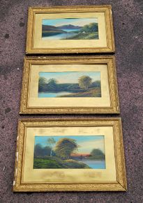 Antique trio of giltwood framed landscapes