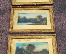 Antique trio of giltwood framed landscapes