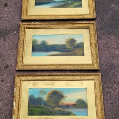 Antique trio of giltwood framed landscapes