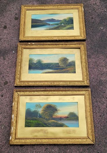 Antique trio of giltwood framed landscapes