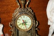 heavy brass clock (battery operated)(in working order)