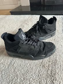 Black Cat Jordan 4s
