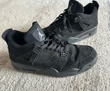 Black Cat Jordan 4s
