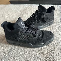 Black Cat Jordan 4s