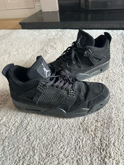 Black Cat Jordan 4s