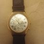 This is a gold-tone Seiko Vintage V657-8110 quartz chronograph watch featuring a cream dial with Roman numerals and three sub-dials Image 3