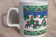 A vintage Christmas mug by Kilncraft (early 1980s) - children at play with snow-sledge design