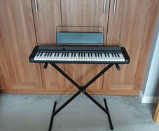 Casio CT-S1 portable keyboard and stand