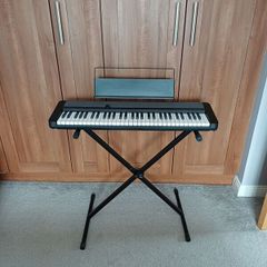 Casio CT-S1 portable keyboard and stand
