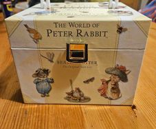 The World Of Peter Rabbit Box One By Beatrix Potter. 12 beautifully illustrated books in Beautiful Illustrated Carring Case. All In Very Good Condition.  See Photos For Same.