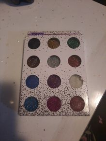 12 assorted pots of glitter