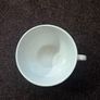 plant pot in the shape of a cup and saucer. Image 3