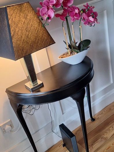 Hall table with lamp and orcid ornament