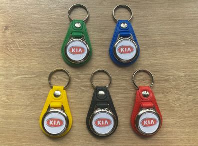 Brand new synthetic leather Kia key ring with shopping trolley token/coin