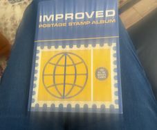 stamp album plus lots of stamps not in album