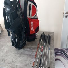Kids golf clubs and bags.