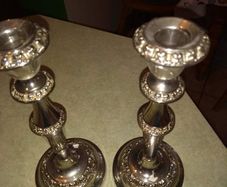 Set of tow silver plated candle holder.  23.5 cm. tall