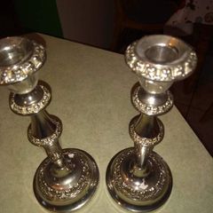 Set of tow silver plated candle holder.  23.5 cm. tall
