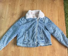 Denim jacket with white fur