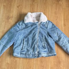 Denim jacket with white fur