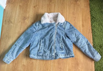 Denim jacket with white fur
