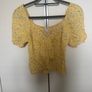 crop top from River Island features a flattering V-neckline and trendy puff sleeves. Image 3