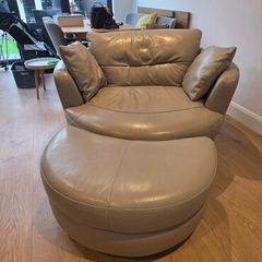 Leather swivel/ cuddle chair with footstool