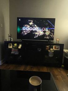 Dark wood effect TV unit
