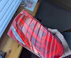 Genuine Hella rear tail light for Audi A4 B8 Sedan.