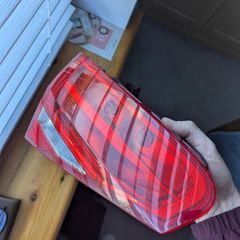 Genuine Hella rear tail light for Audi A4 B8 Sedan.