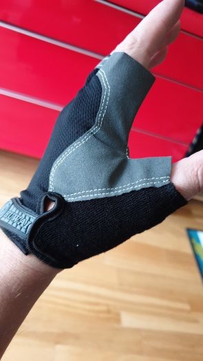 Gym gloves. Fingerless gloves. Cycling gloves. Work gloves. Carpenter gloves. Weightlifting. Workout.  Fitness.  Bodybuilding