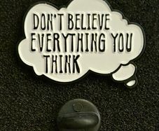 Dont believe everything you think. Pin back badge.