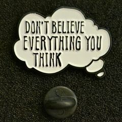 Dont believe everything you think. Pin back badge.