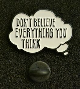 Dont believe everything you think. Pin back badge.
