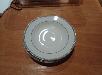 Four Royal Doulton Shallow Soup Bowls