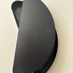Black, plastic Emirates box